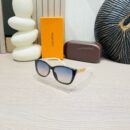 Louis Vuitton Premium Sunglasses with a White Black Gold Frame